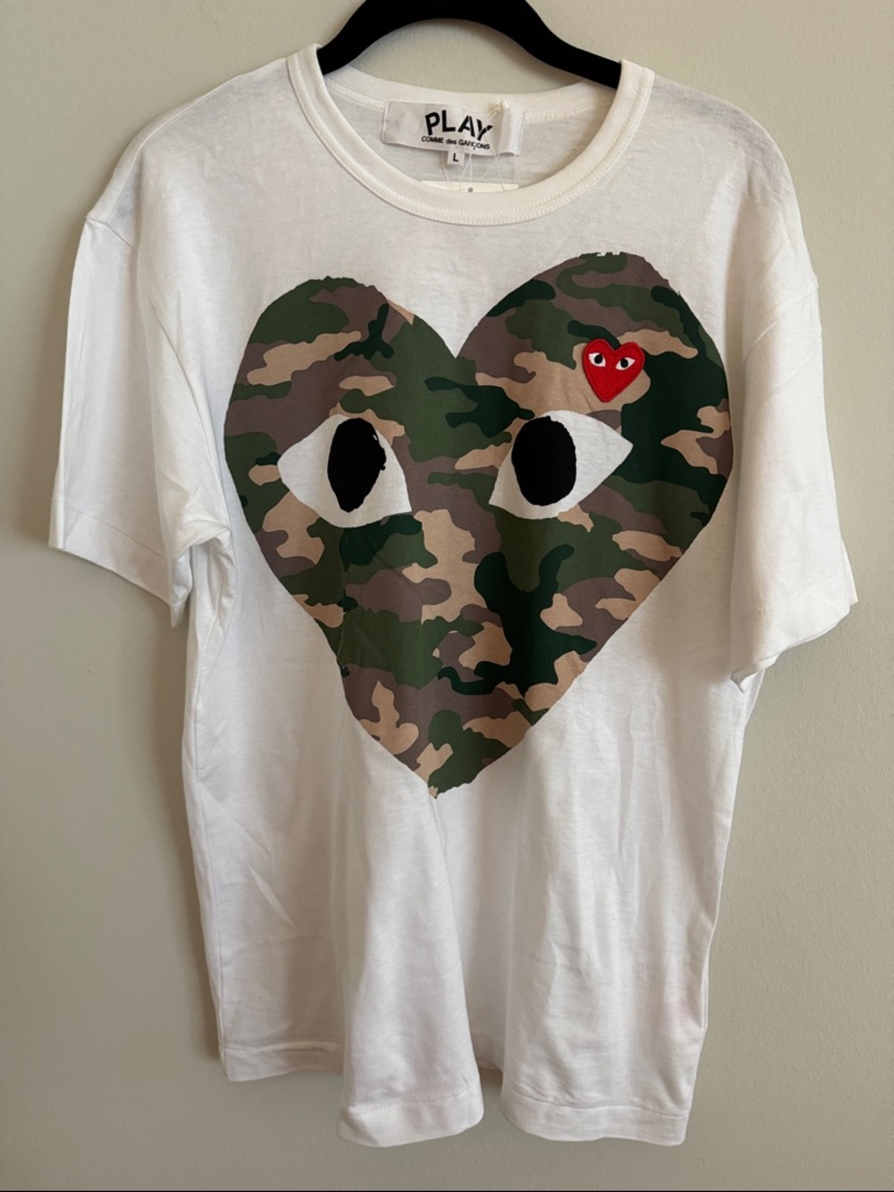 Comme des Garçons PLAY White Tee with Green Camo Heart and Red Heart Accent